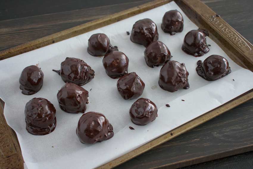 Just dipped truffles waiting for the chocolate coating to harden