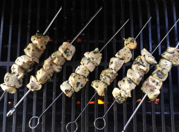 Grilling the pork souvlaki kebabs