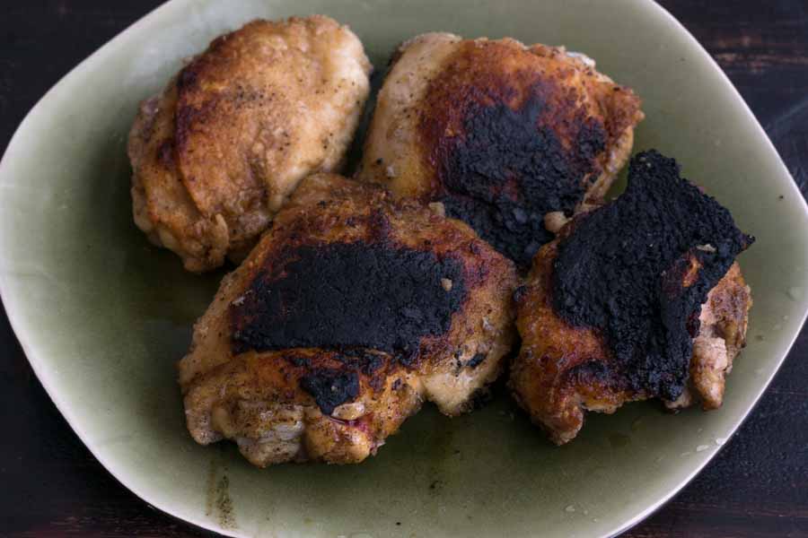 The chicken thighs after browning on high for 5 minutes per side