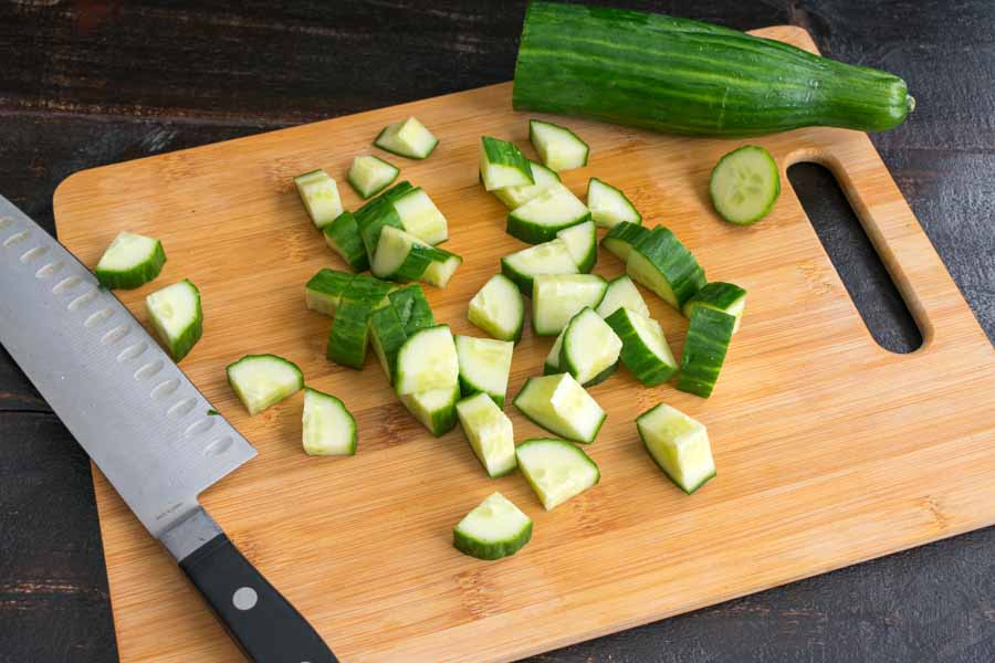 Chopping the cucumber