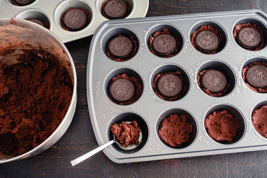 Filling the muffin tins with brownie batter and sandwich 