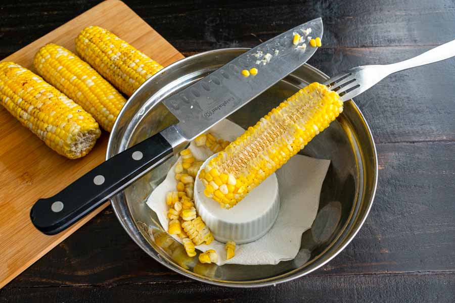 Cutting the corn off the cob