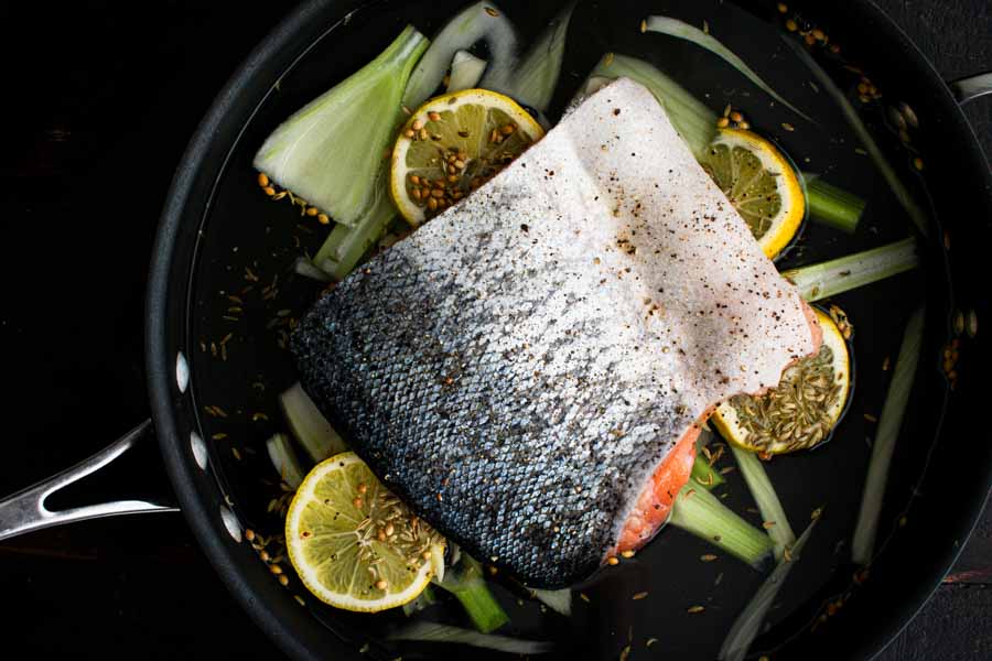 Prepped salmon and fennel in a saute pan
