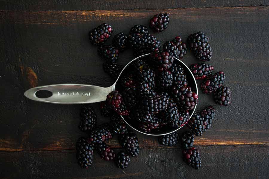 Measuring the blackberries for the simple syrup