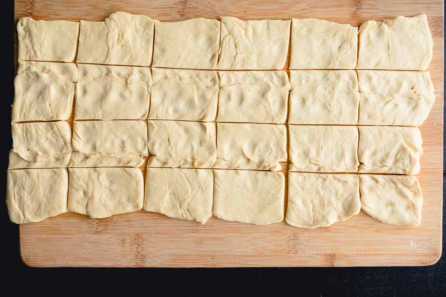 Crescent roll dough cut into (sort of) squares
