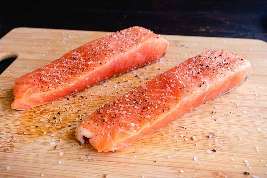 Salmon fillets seasoned with kosher salt and freshly ground black pepper