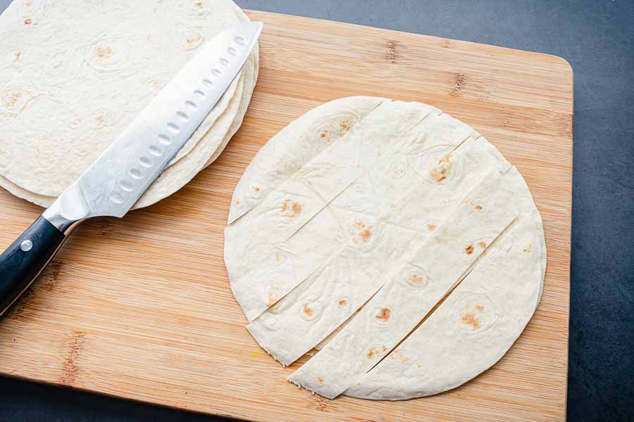 Slicing the tortillas into strips