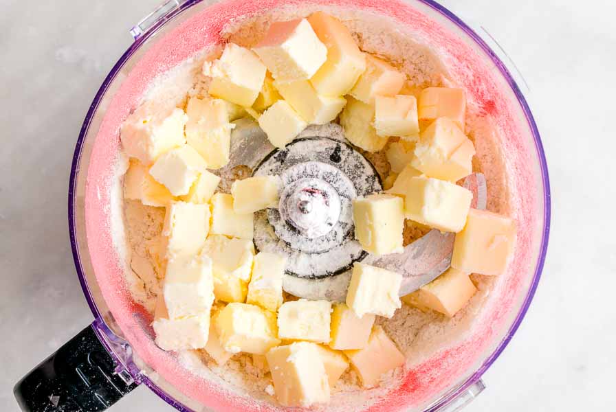 Mixing the pie crust ingredients in a food processor