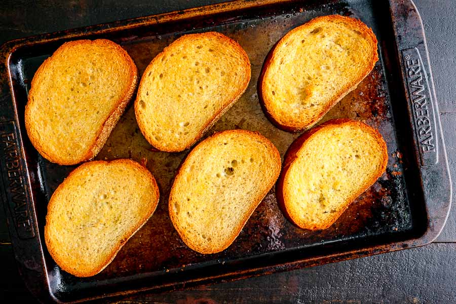 Thick slices of toasted Italian bread