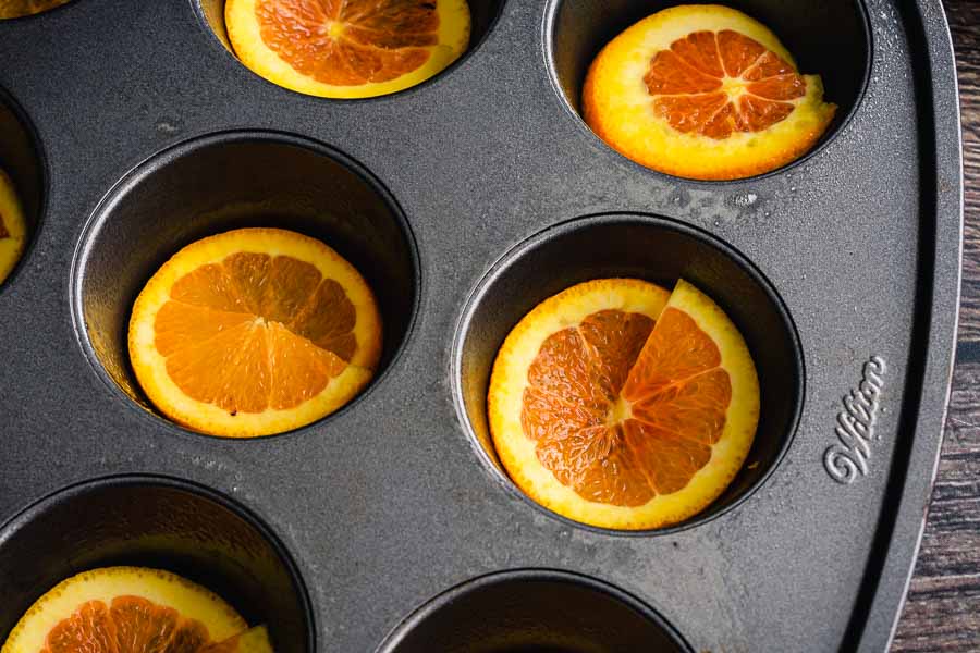 My first attempt at fitting orange slices into the muffin tin