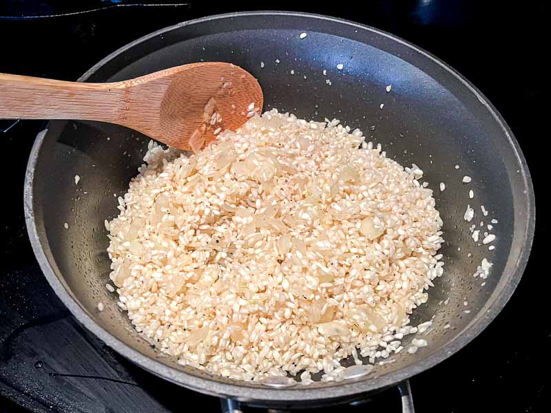 Arborio rice mixed with the softened onions