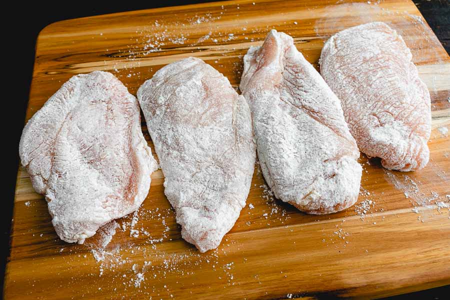 Chicken cutlets dredged in seasoned flour