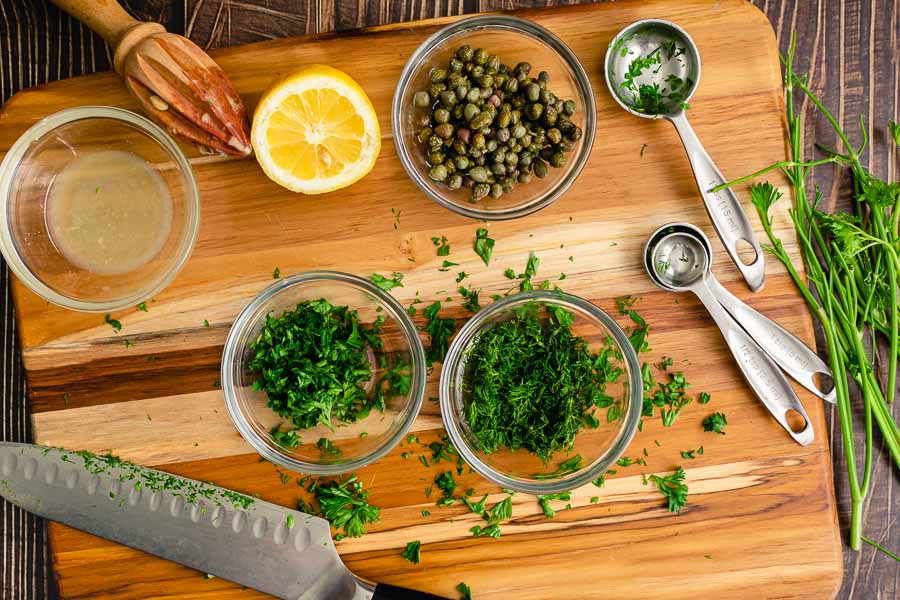 Freshly chopped parsley and dill with lemon juice and capers