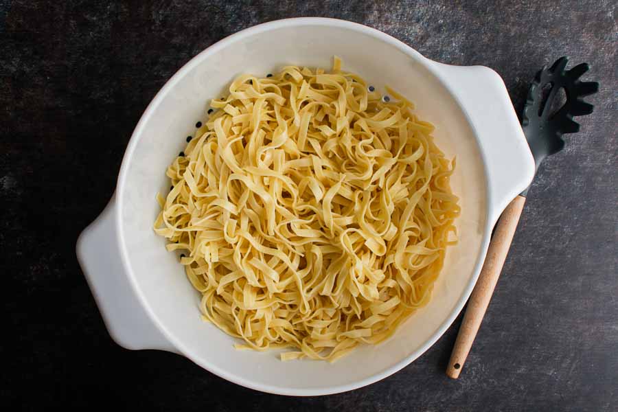 Cooked and drained tagliatelle pasta