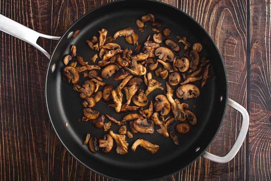 Browned wild mushrooms in a non-stick saute pan