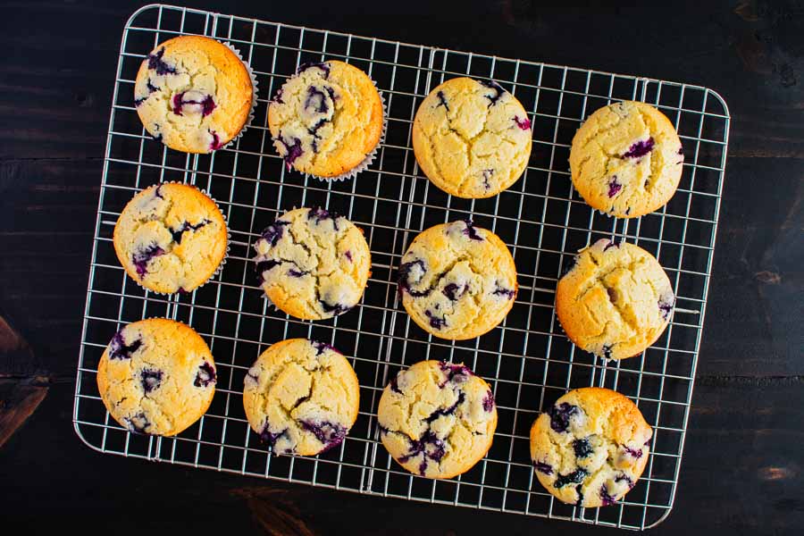 Blueberry muffins on a wire cooling rack