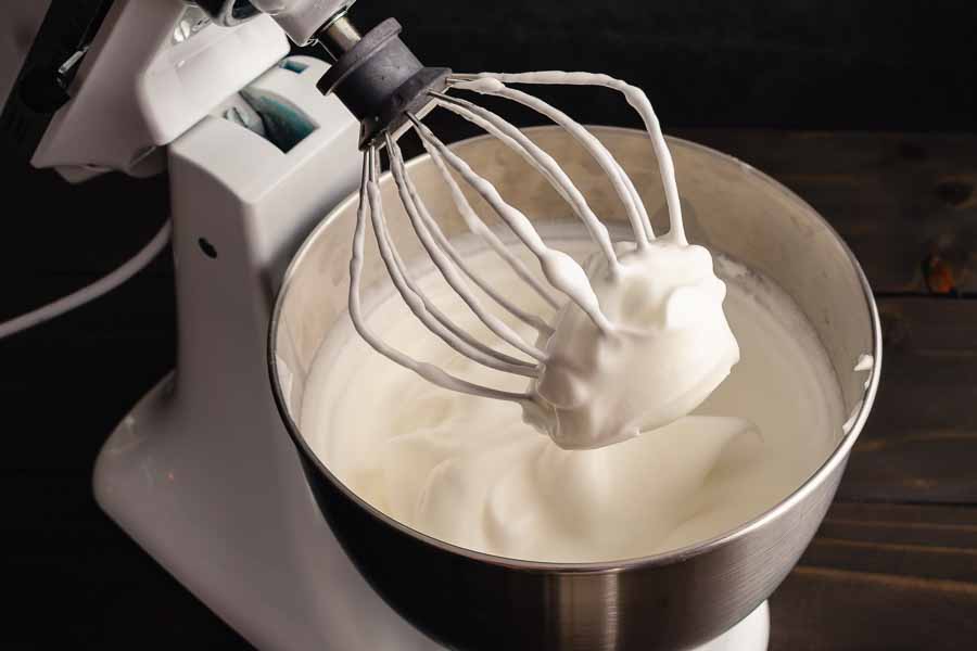 I used my stand mixer's whisk attachment to whip the egg whites, cream of tartar, almond extract, and vanilla extract for 10 minutes