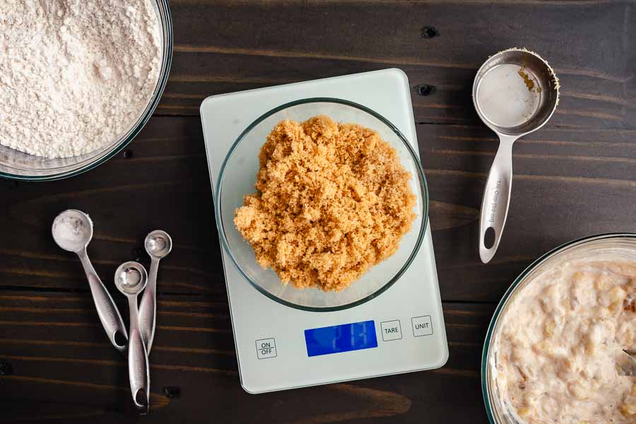 Weighing brown sugar on a digital kitchen scale