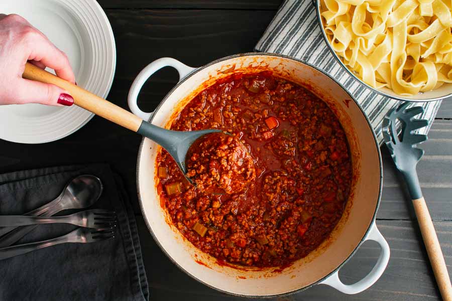 Authentic Bolognese Sauce simmered in a cast-iron Dutch oven