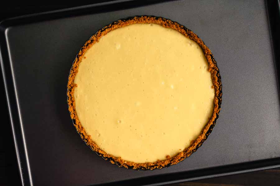 Baked and cooled cheesecake layer