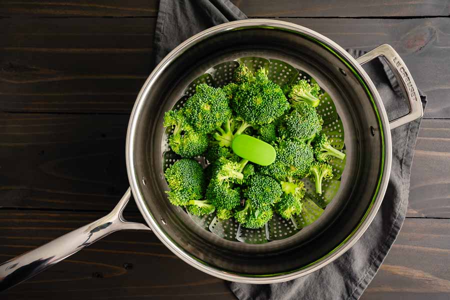 Steaming broccoli in a large saute pan