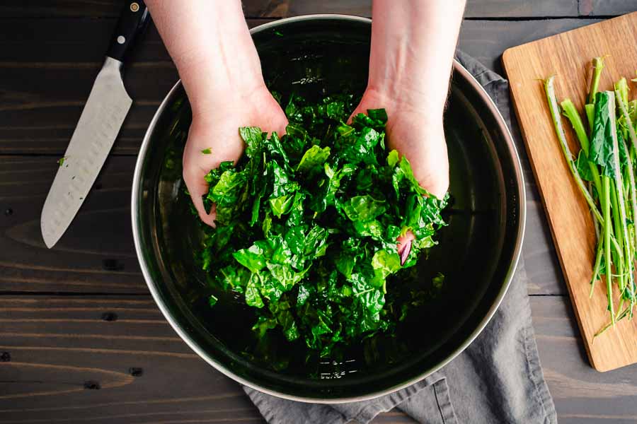 Massaging kale with avocado oil